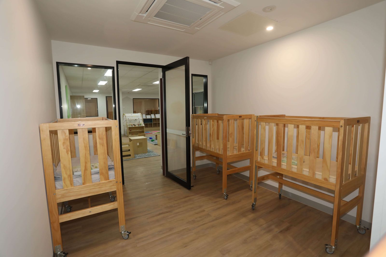 Timber cots in the cot room
